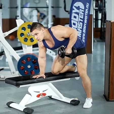 Отведение гантелей назад в наклоне