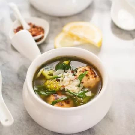 Soup with meatballs and smoked chicken breast