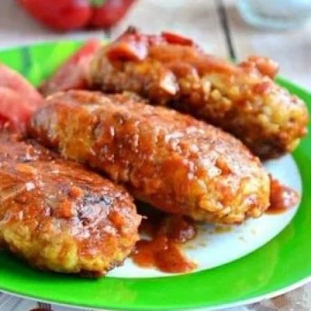 Cutlets with cabbage, stewed in sauce