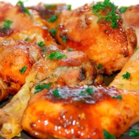 Chicken legs with sour cream and cheese