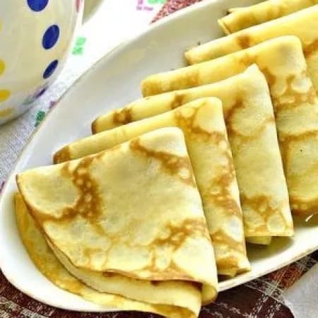 Pancakes with mayonnaise and eggs