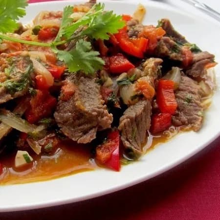 Stewed meat with mushrooms and sweet pepper