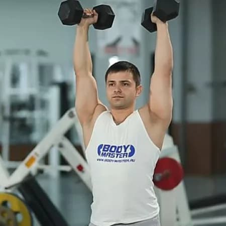 Жим гантелей стоя