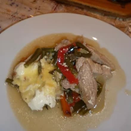 Turkey with vegetables in pots