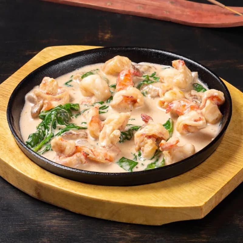 Seafood in Sour Cream Sauce with Onion and Garlic